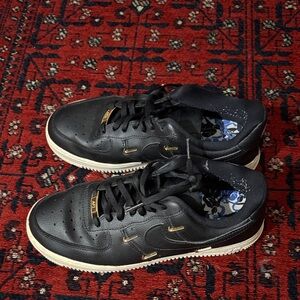 Nike Black and Gold Sneakers